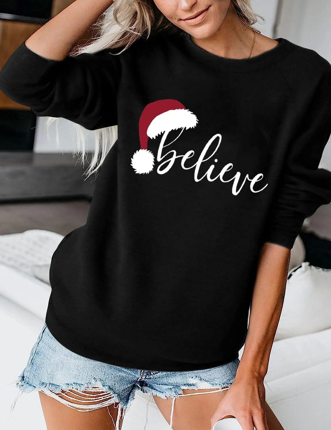 RFBIQI Christmas Believe Sweatshirt Women Cute Santa Hat Graphic Pullover Tops Letter Print Long Sleeve Casual Holiday Shirt